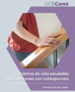 portada de la guia de prevencion de caidas con osteoporosis con una mano agarrando una barandilla